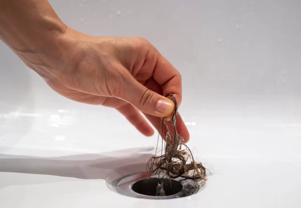 removing-hair-from-bath-drain removing-hair-from-bath-drain